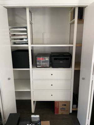 A picture of the new shelves and drawers in our office closet, still mostly empty.