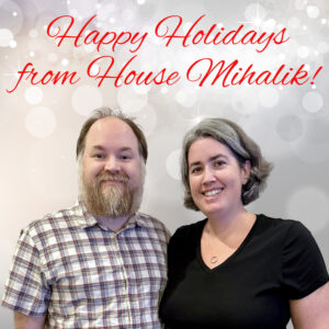 A picture of Mr. M and me with a festive background. Happy Holiday from House Mihalik!